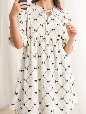 Women’s Cream Midi Dress with Black Bow Print